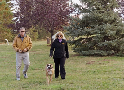 Diane and Bill Monahan walking their dog at CAM-PLEX Park in Gillette, Wyoming